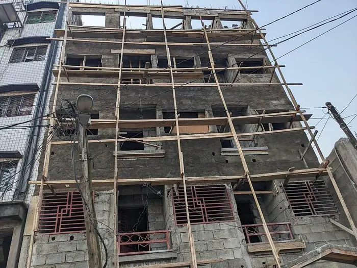 Clifton Group building construction, facade scaffolding, low angle