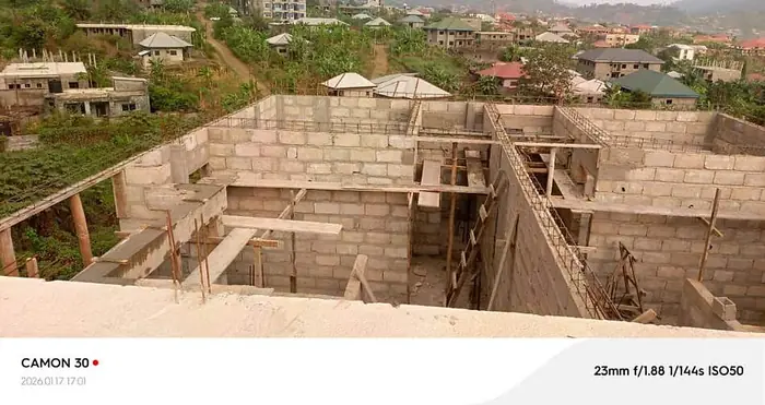 Clifton Group building construction, foundation walls on a hillside site