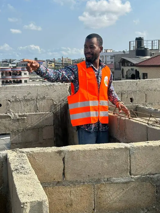 Clifton Group engineer reviewing structural work on-site