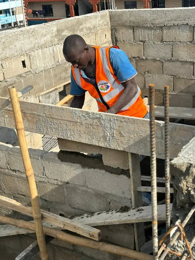 Clifton Group site supervisor on an active build in Douala